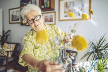 Senior Woman Arranging Flowers
